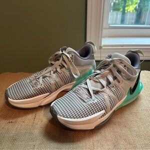 Woman’s Nike LeBron 7 Witness basketball sneakers.